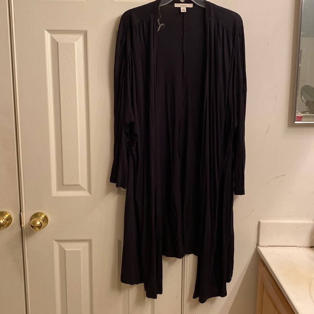Sejour Shrug black. Hangs hi low. Open front